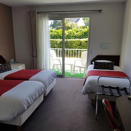 Hotel Le Roudou Fouesnant Bagian luar foto