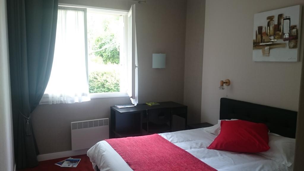 Hotel Le Roudou Fouesnant Bagian luar foto