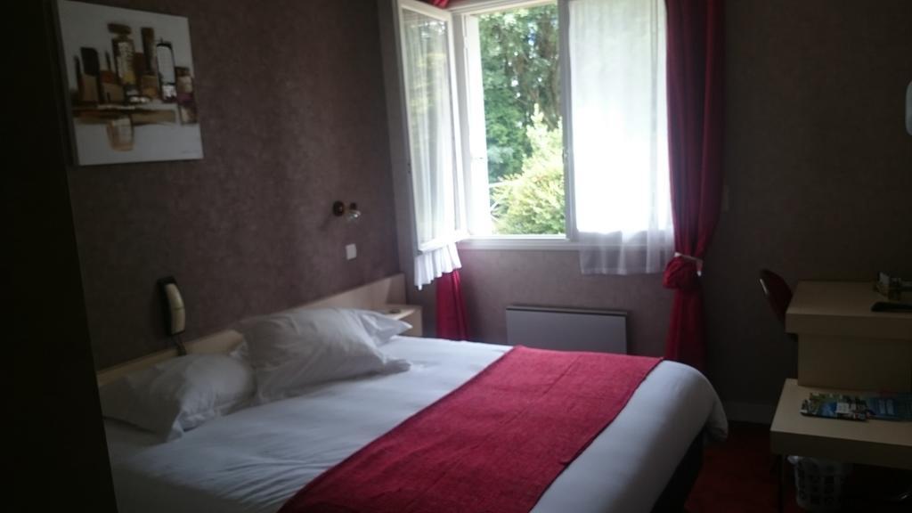 Hotel Le Roudou Fouesnant Bagian luar foto