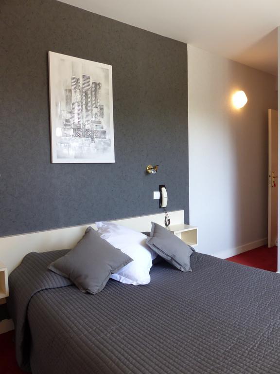 Hotel Le Roudou Fouesnant Bagian luar foto