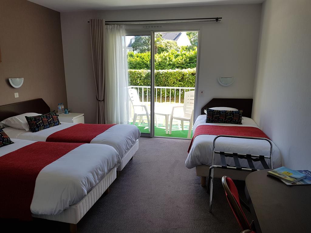 Hotel Le Roudou Fouesnant Bagian luar foto