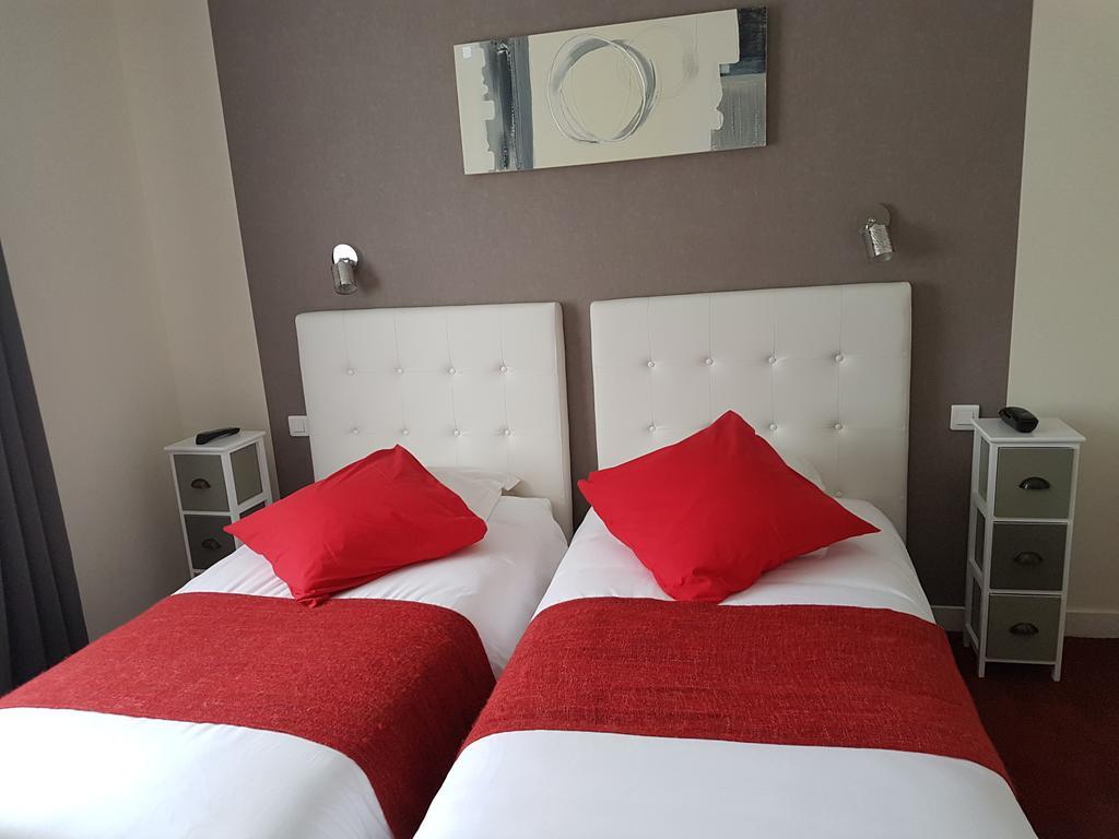 Hotel Le Roudou Fouesnant Bagian luar foto