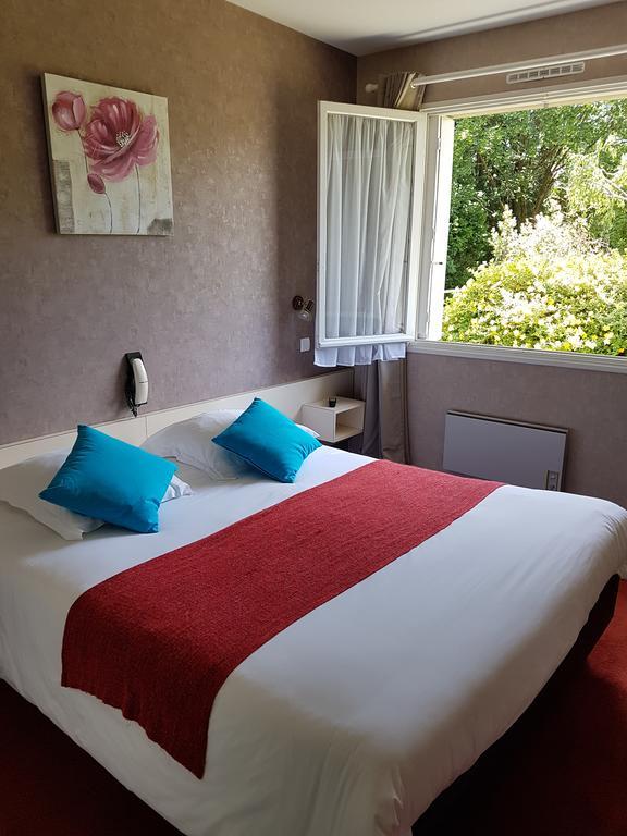 Hotel Le Roudou Fouesnant Bagian luar foto