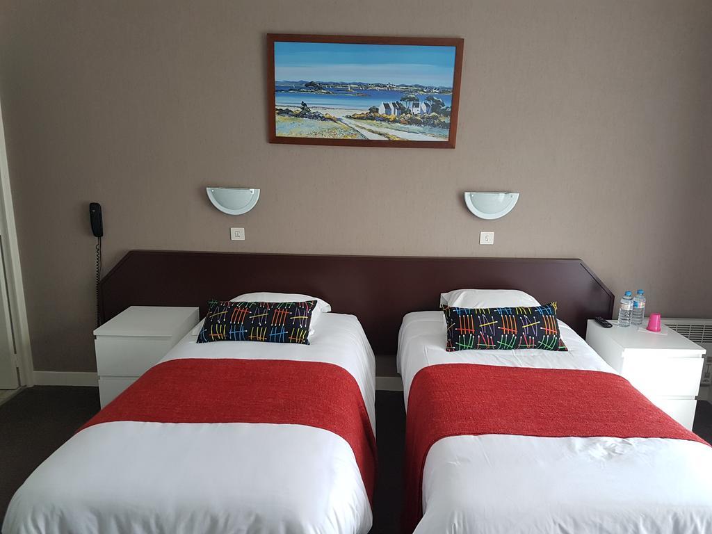 Hotel Le Roudou Fouesnant Bagian luar foto