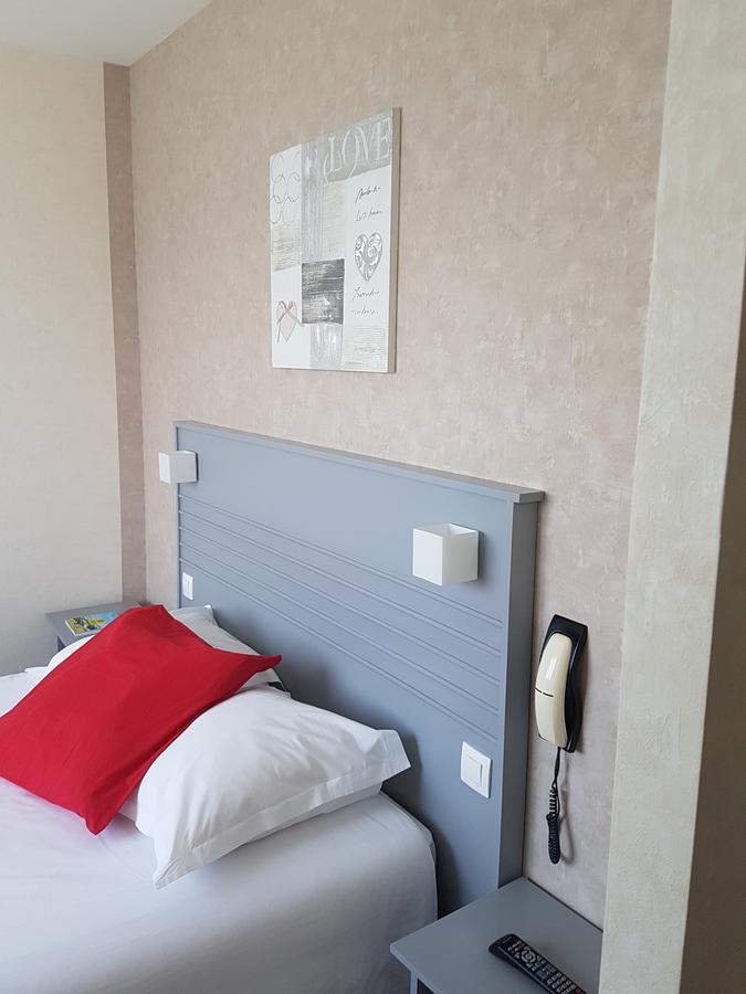 Hotel Le Roudou Fouesnant Bagian luar foto